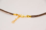 Gold starfish necklace, brown cord - shani-adi-jewerly