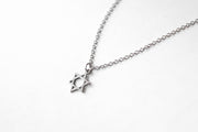 A silver Star of David necklace with a stainless steel chain, displayed against a white background.