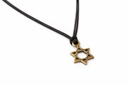 Necklace with a bronze Star of David pendant on a white background