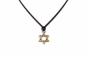 Necklace with a bronze Star of David pendant on a white background