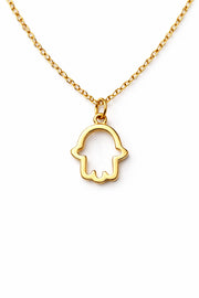 Gold Hamsa hand necklace on a white background