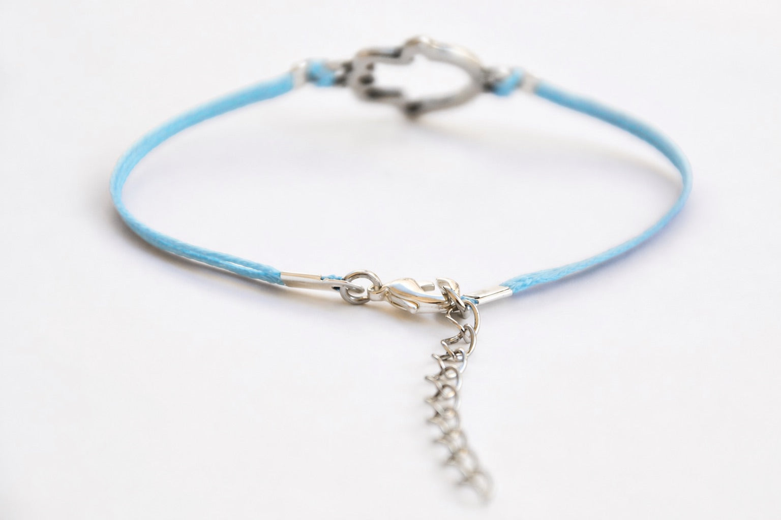 Blue cord bracelet with silver Hamsa charm - shani-adi-jewerly
