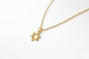 Gold necklace with a Star of David pendant for men