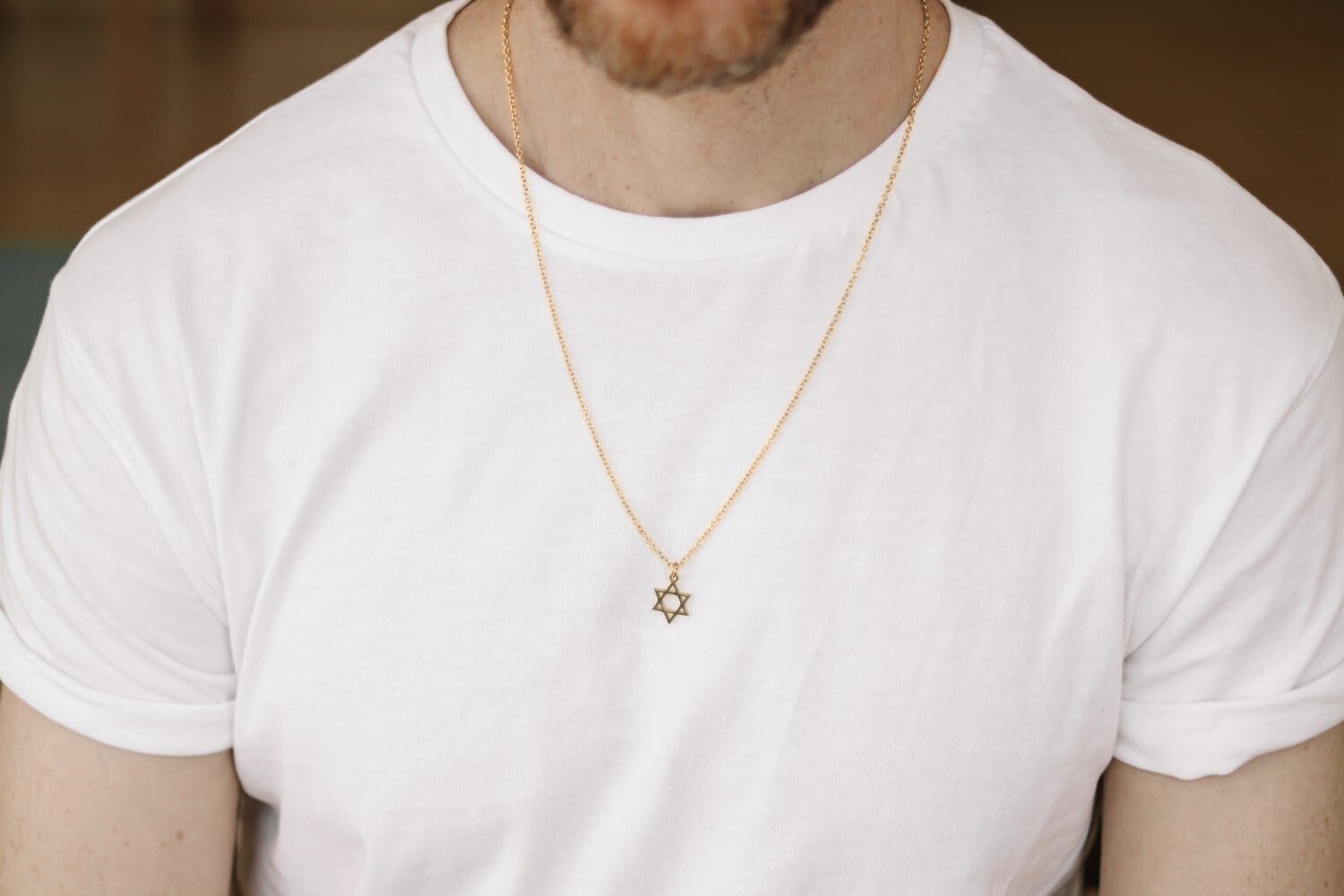 Gold necklace with a Star of David pendant for men