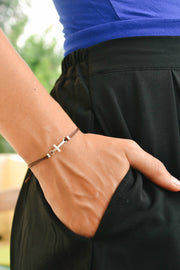 Women bracelet with silver cross charm, brown cord - shani-adi-jewerly