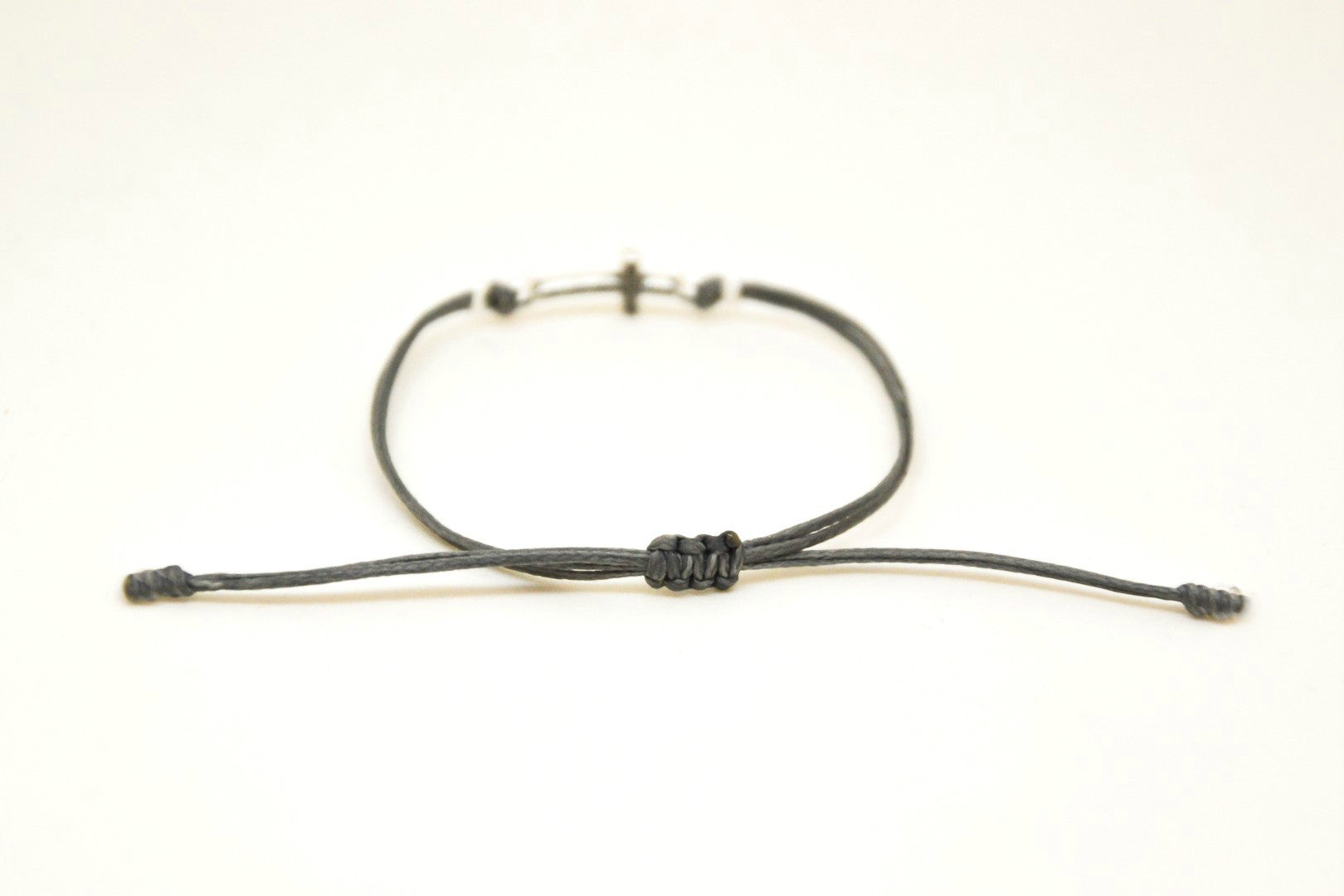 Silver cross charm bracelet, gray cord, adjustable sliding knot - shani-adi-jewerly