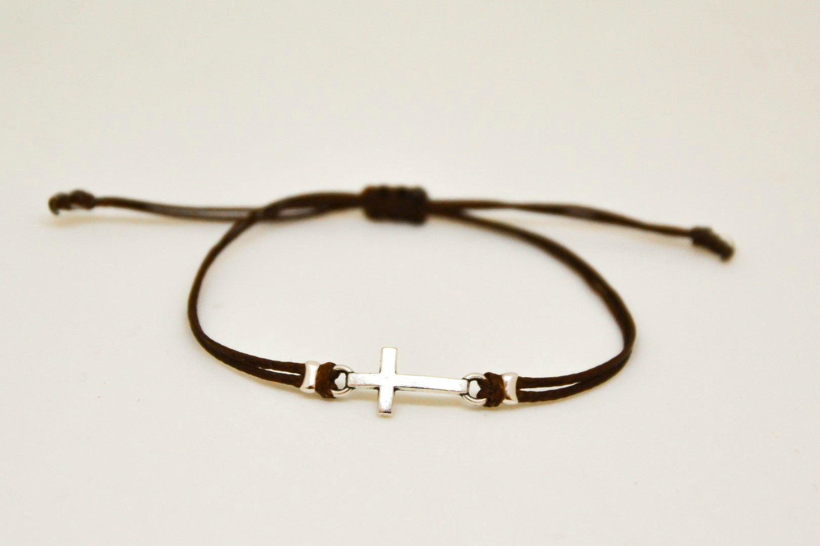 Women bracelet with silver cross charm, brown cord - shani-adi-jewerly
