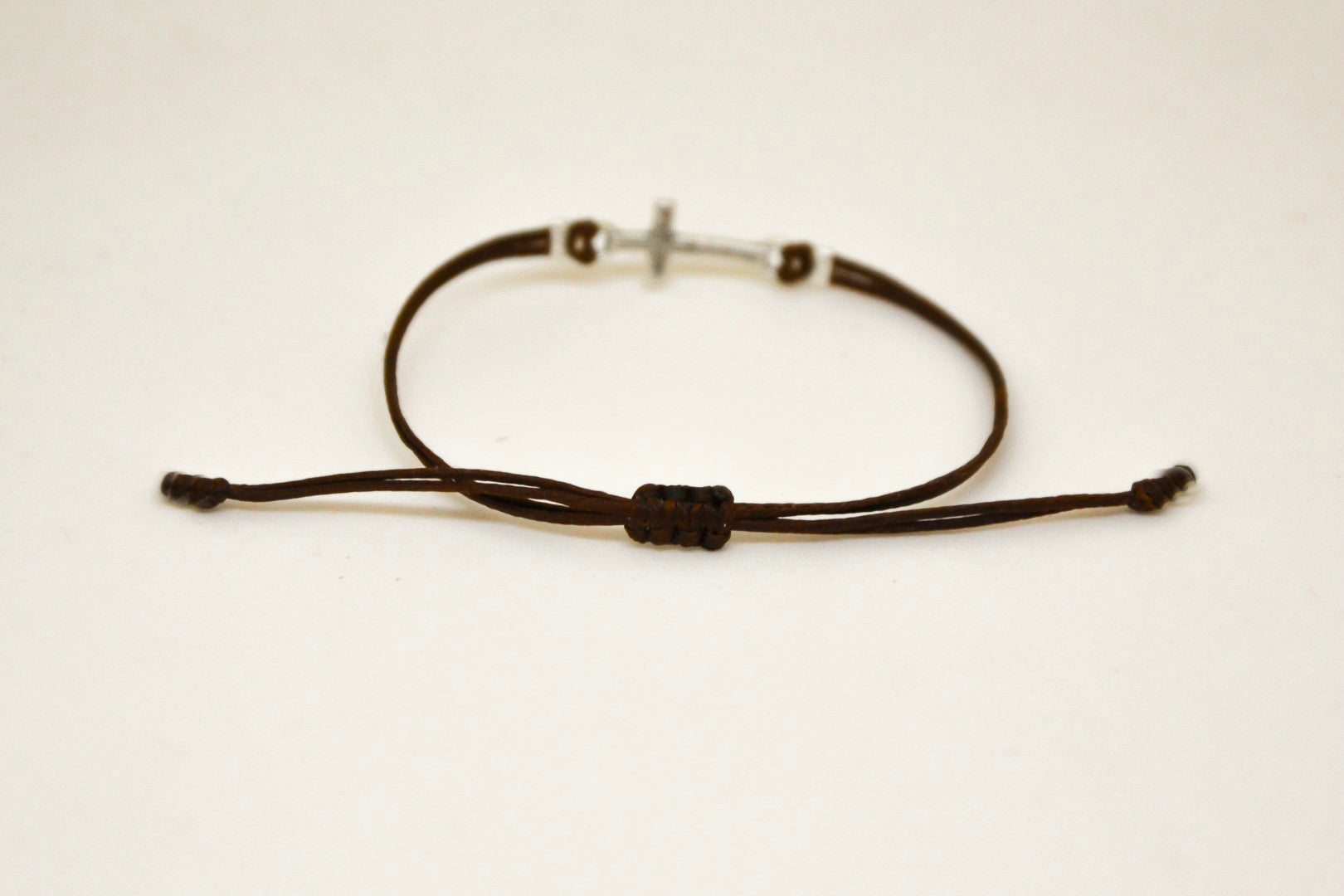 Women bracelet with silver cross charm, brown cord - shani-adi-jewerly