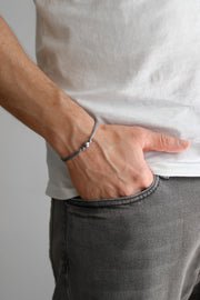 Men's bracelet with silver bead charm and a gray cord - shani-adi-jewerly
