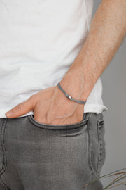 Men's bracelet with silver bead charm and a gray cord - shani-adi-jewerly