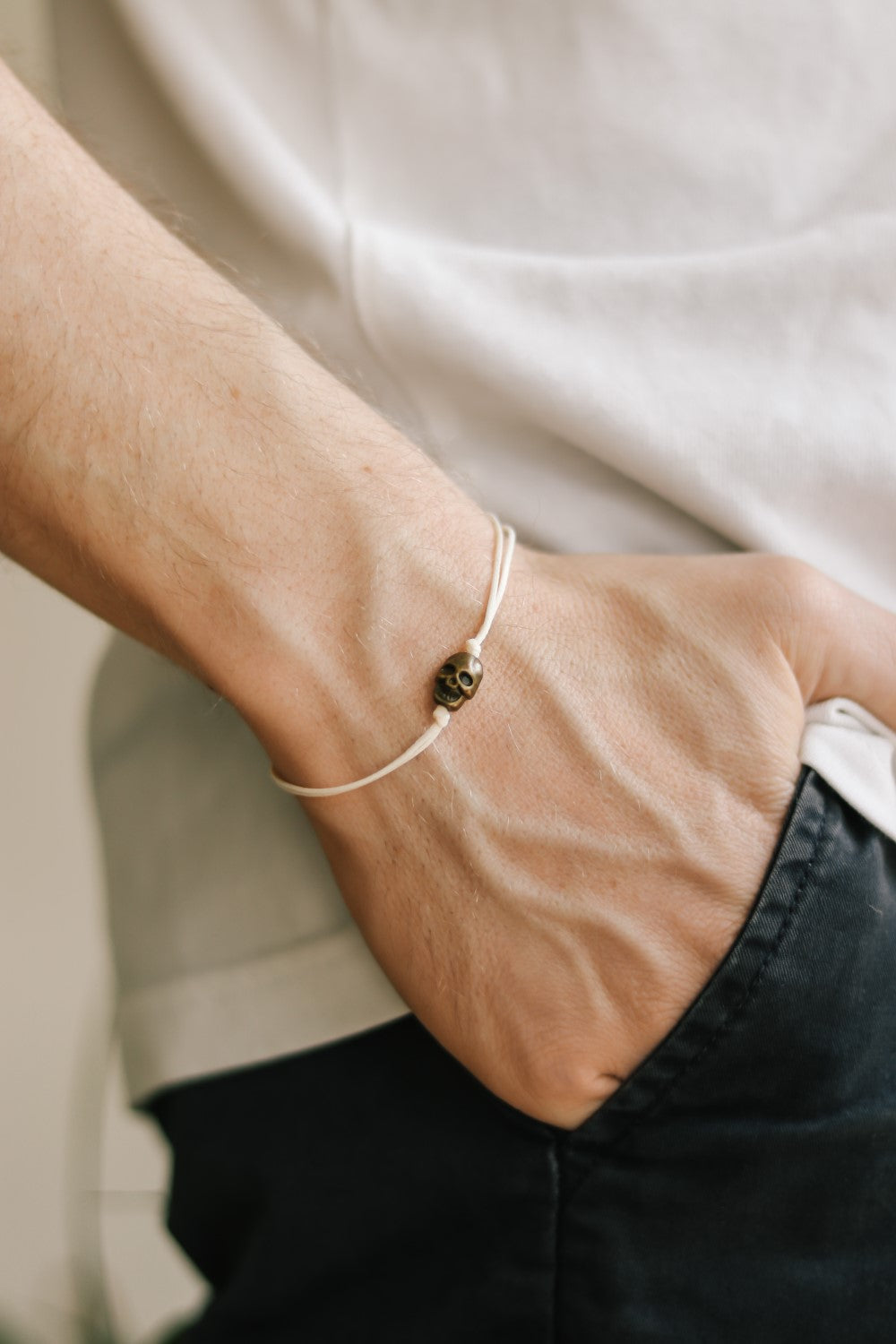 Bronze skull bead bracelet for men with beige cord a gift for him