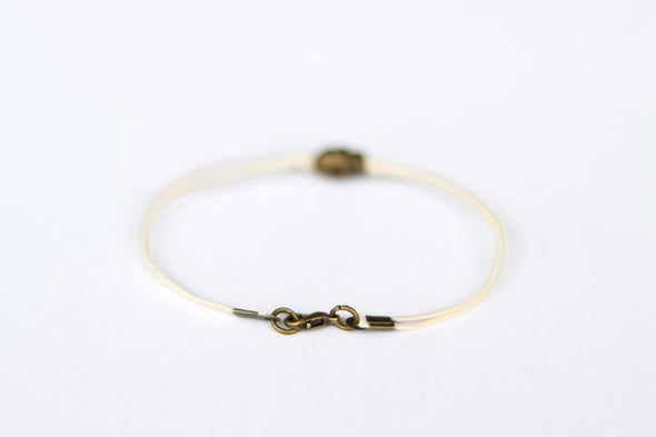 Bronze skull bead bracelet for men, beige cord, gift for him
