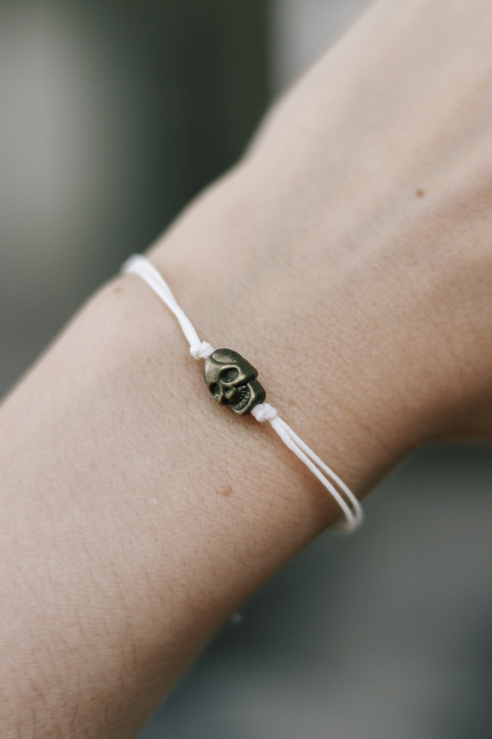 Bronze skull bead bracelet with beige string a gift for her with adjustable closure