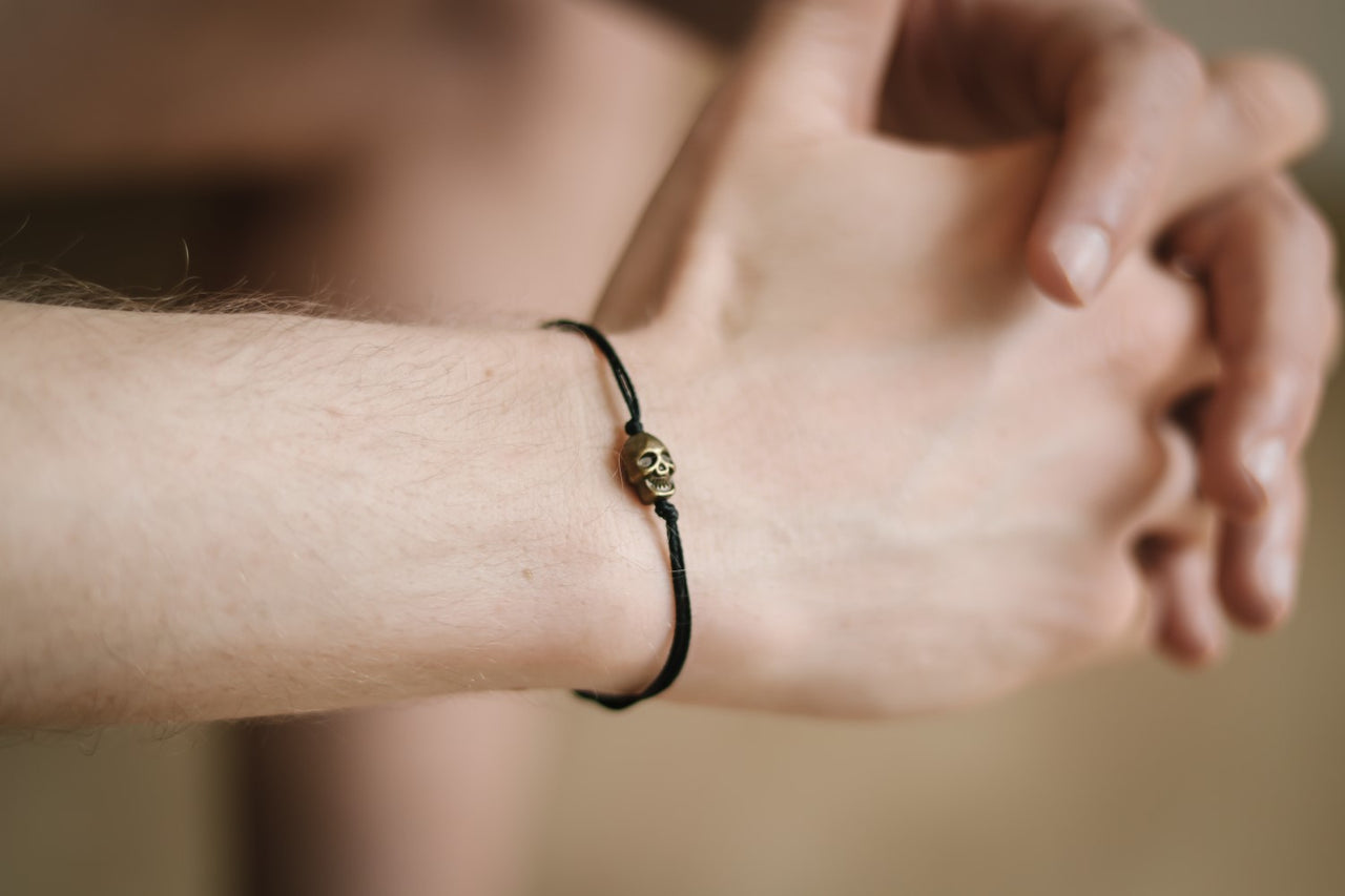Bronze skull bead bracelet for men with black cord a gift for him