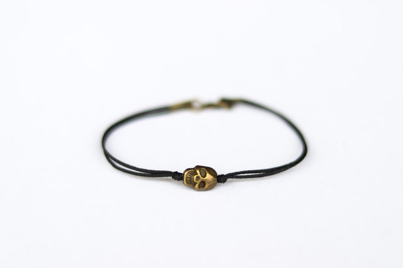Bronze skull bead bracelet for men with black cord a gift for him