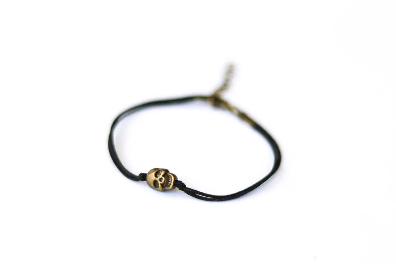 Bronze skull bead bracelet with black string a gift for her with adjustable closure
