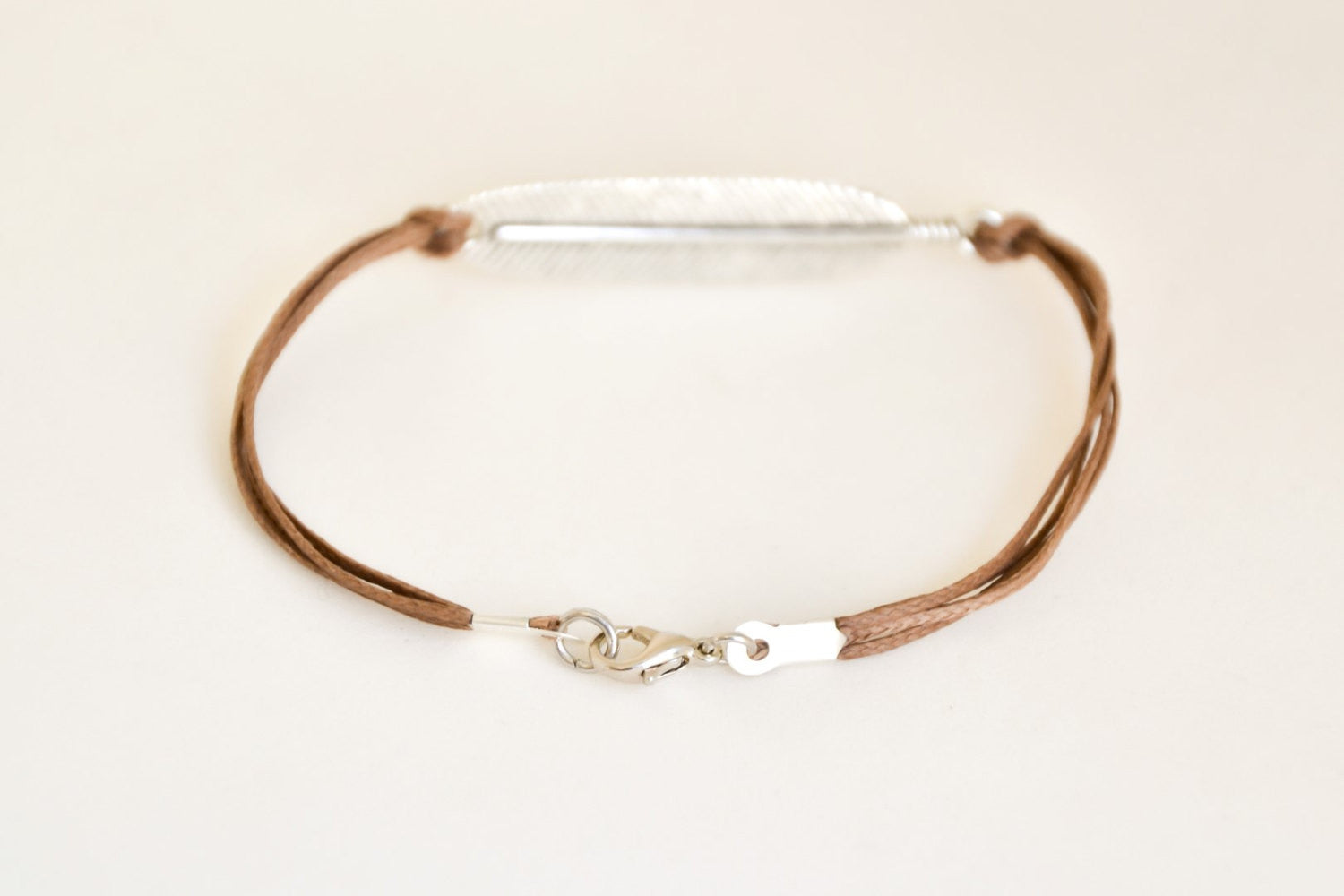 Silver feather bracelet for men, brown cord - shani-adi-jewerly