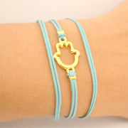Turquoise cord wrap bracelet with gold hamsa charm - shani-adi-jewerly