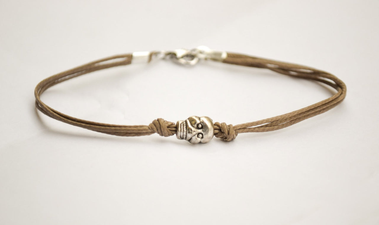 Men's bracelet with a silver skull charm and a brown cord - shani-adi-jewerly