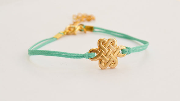 Turquoise cord bracelet with gold endless knot charm - shani-adi-jewerly