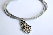 Gray cord bracelet with a hamsa charm - shani-adi-jewerly