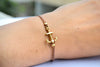 Brown bracelet with gold anchor charm - shani-adi-jewerly