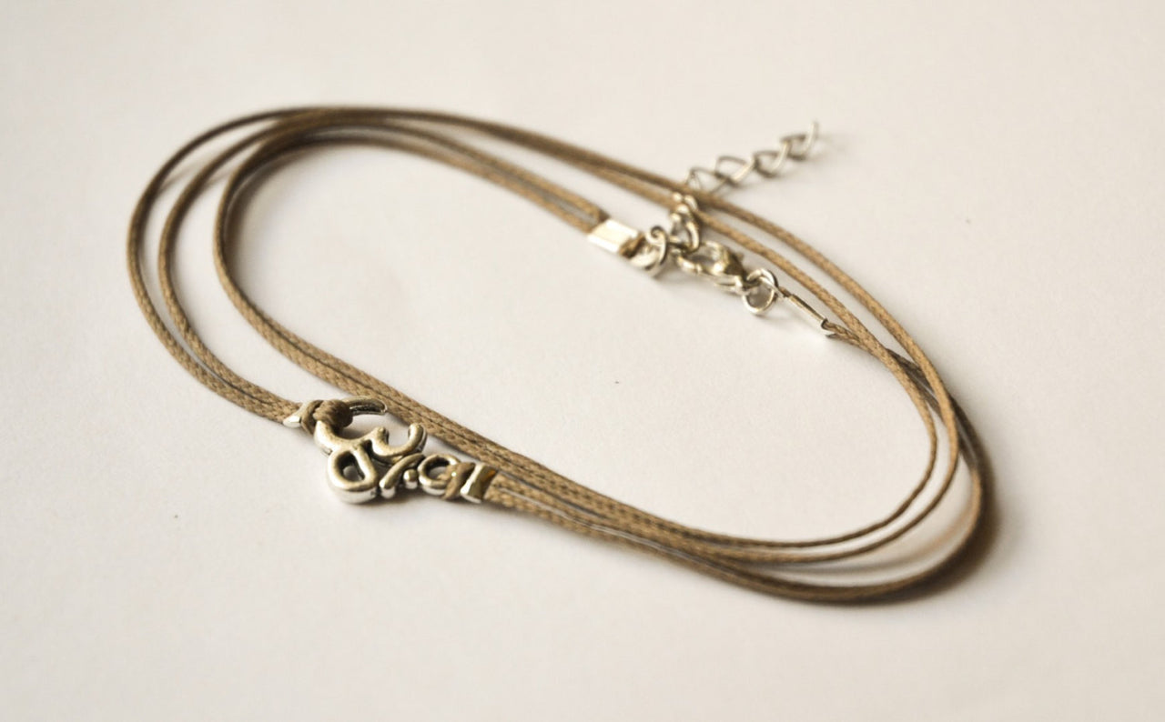 Om wrap anklet with brown cord - shani-adi-jewerly