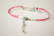 Pink cord bracelet with a silver love charm - shani-adi-jewerly