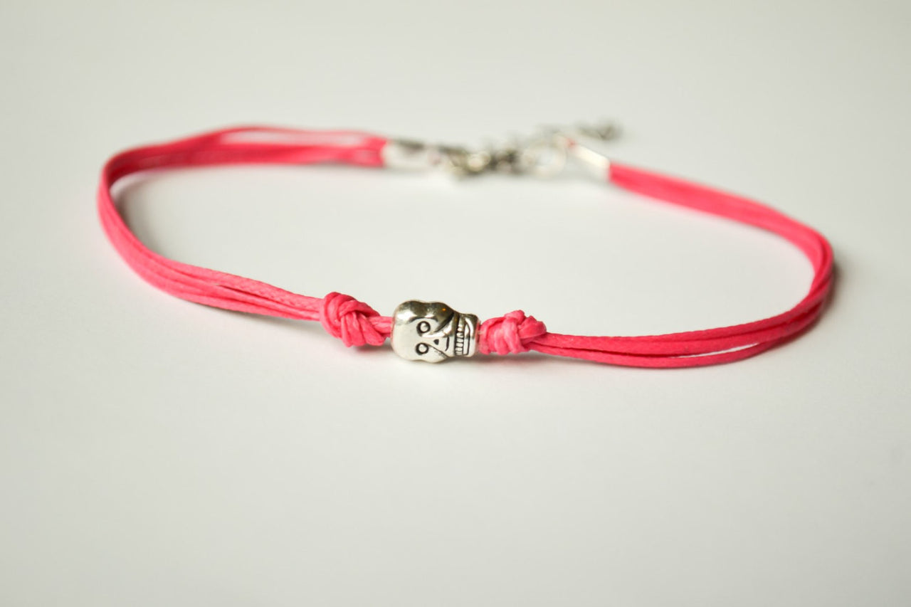 Pink cord bracelet with a silver skull charm - shani-adi-jewerly