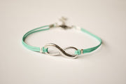 turquoise cord bracelet with a silver infinity charm - shani-adi-jewerly