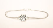 Yoga bracelet with a silver endless knot charm - shani-adi-jewerly