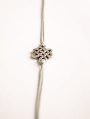 Yoga bracelet with a silver endless knot charm - shani-adi-jewerly