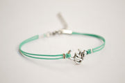 Turquoise bracelet with Tibetan silver Om charm - shani-adi-jewerly