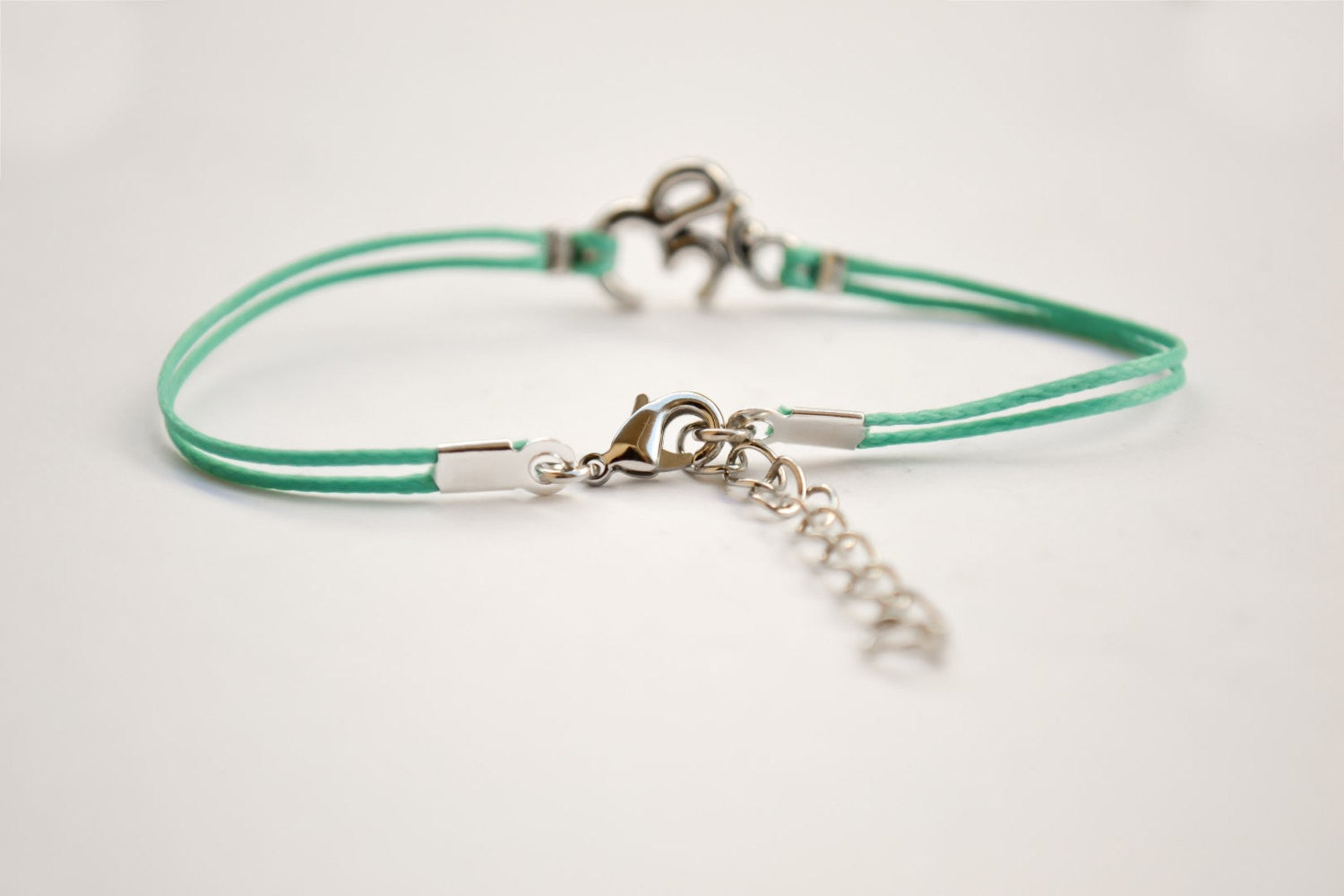 Turquoise bracelet with Tibetan silver Om charm - shani-adi-jewerly