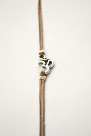 Sanskrit bracelet, wrapped brown strand with silver Om charm, Yoga - shani-adi-jewerly