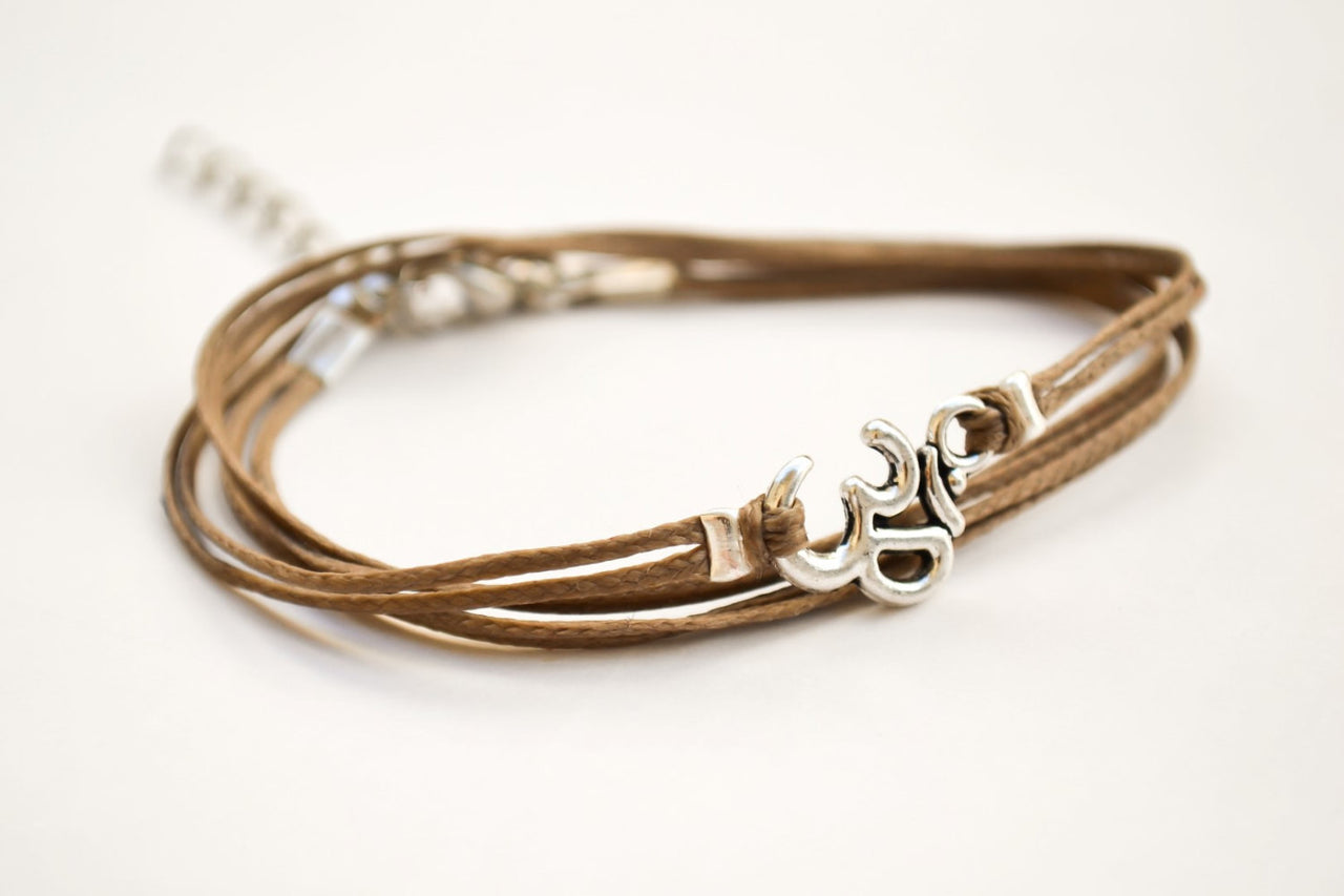 Sanskrit bracelet, wrapped brown strand with silver Om charm, Yoga - shani-adi-jewerly