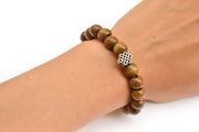 Wood beads stretch bracele with silver celtic endless knot charm - shani-adi-jewerly