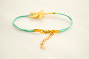 Turquoise cord bracelet with a gold sea star charm - shani-adi-jewerly