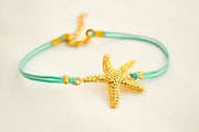 Turquoise cord bracelet with a gold sea star charm - shani-adi-jewerly