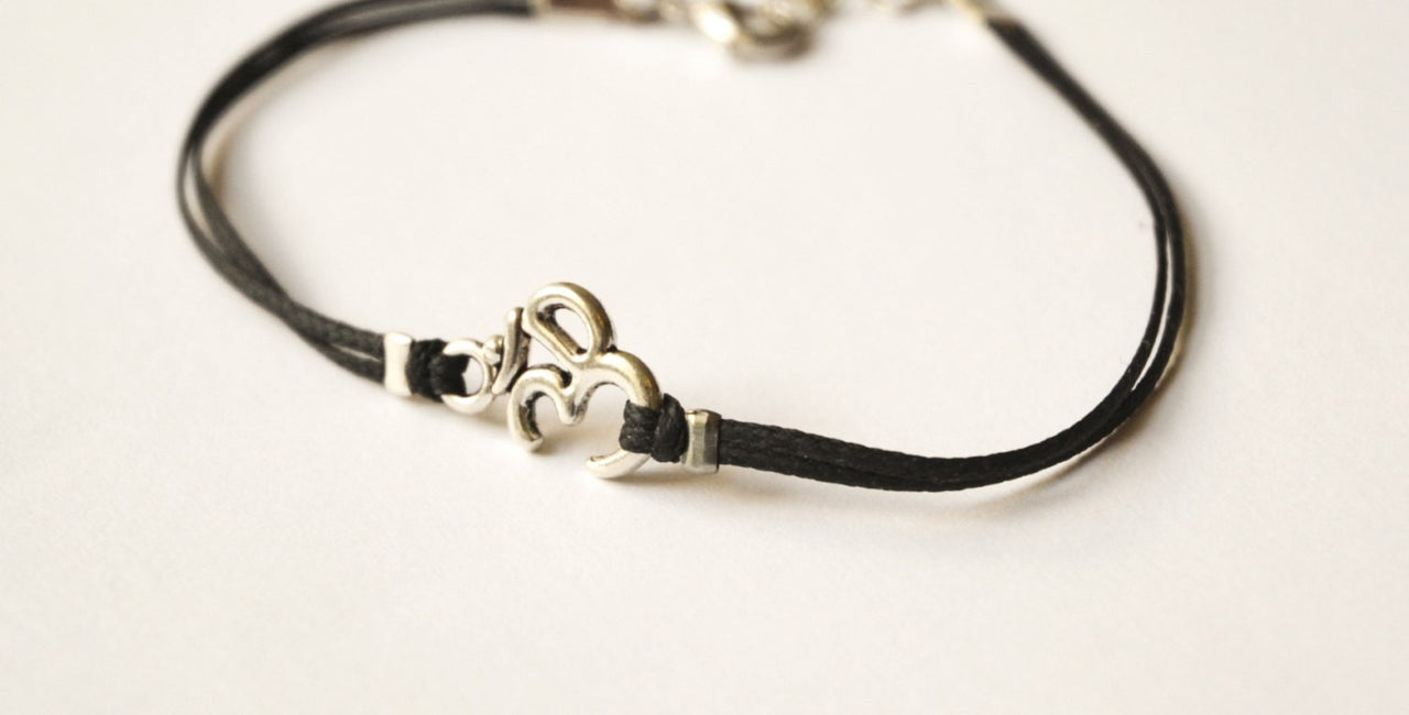 Om bracelet for men, black cord - shani-adi-jewerly