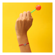 Women bracelet with Tibetan silver Om charm, red cord - shani-adi-jewerly