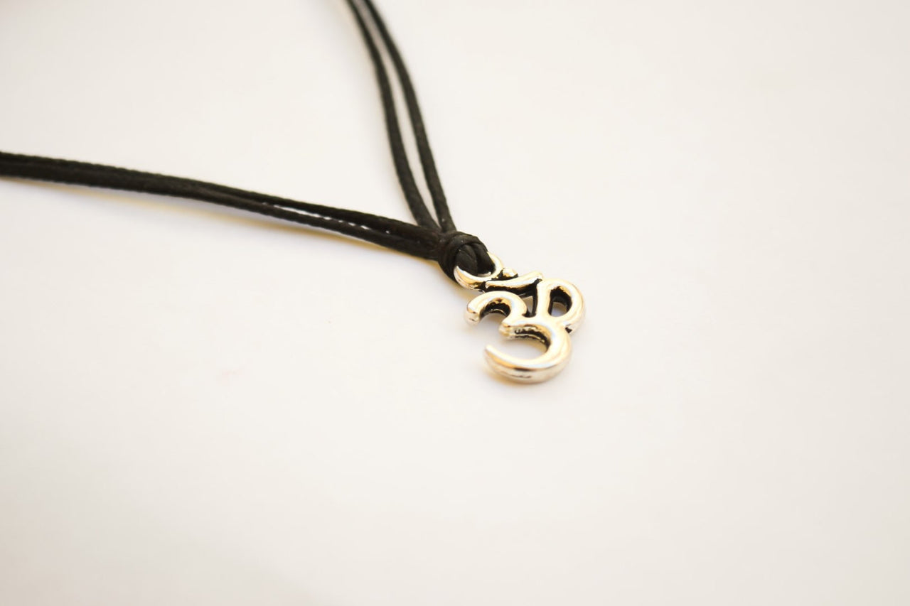 Silver Om necklace for men, black cord - shani-adi-jewerly