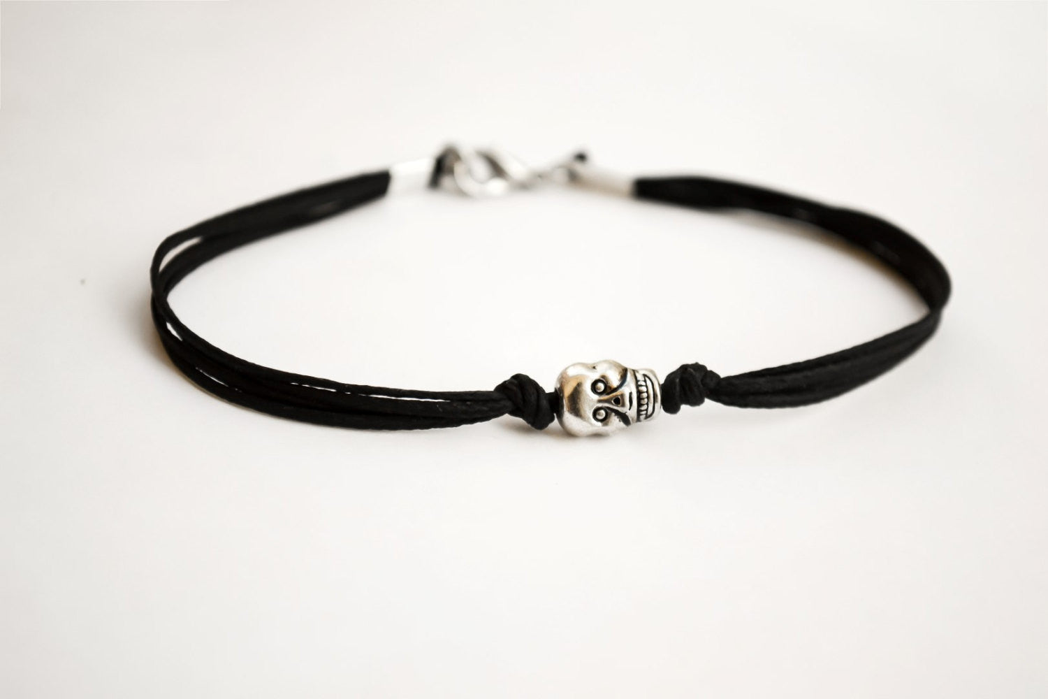 Men's bracelet with a silver skull charm and a black cord - shani-adi-jewerly