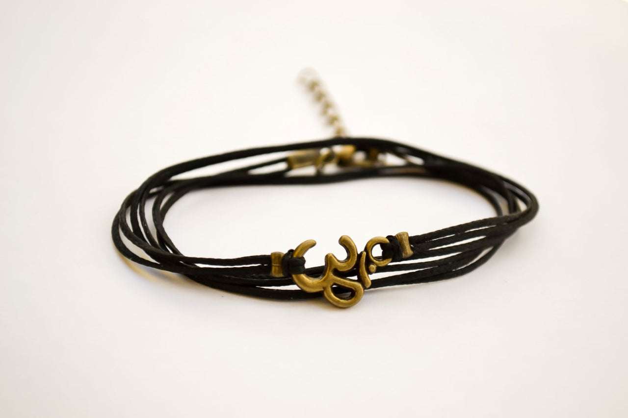 Wrapped bracelet with bronze tone Om charm - shani-adi-jewerly