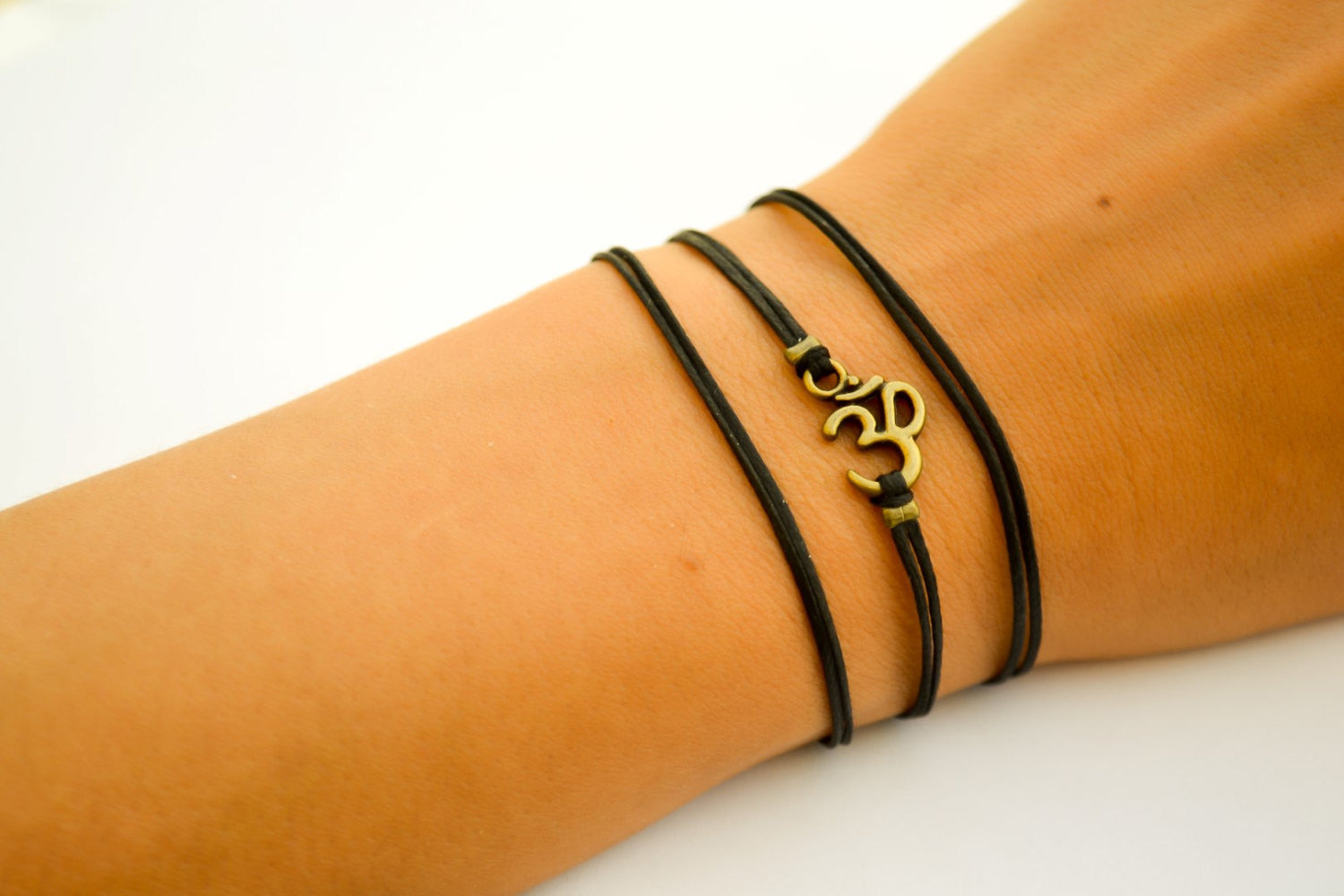 Wrapped bracelet with bronze tone Om charm - shani-adi-jewerly