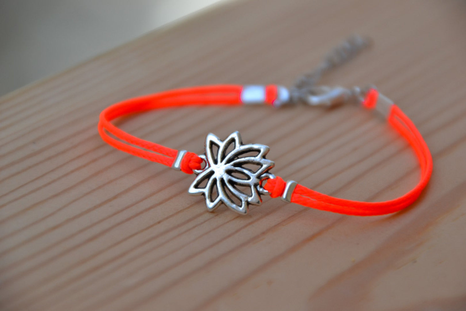 Bright peach cord bracelet with silver lotus charm - shani-adi-jewerly