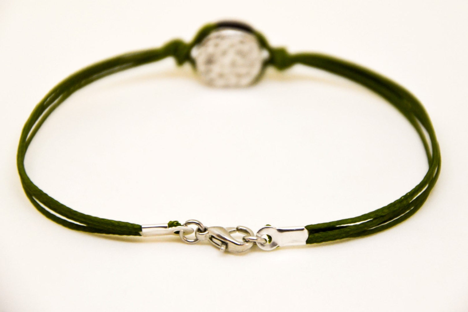 Green cord bracelet for men with a silver round charm - shani-adi-jewerly