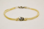 Silver skull bracelet for men, beige cord - shani-adi-jewerly