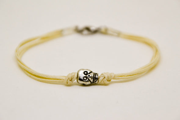 Silver skull bracelet for men, beige cord - shani-adi-jewerly