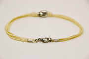 Silver skull bracelet for men, beige cord - shani-adi-jewerly